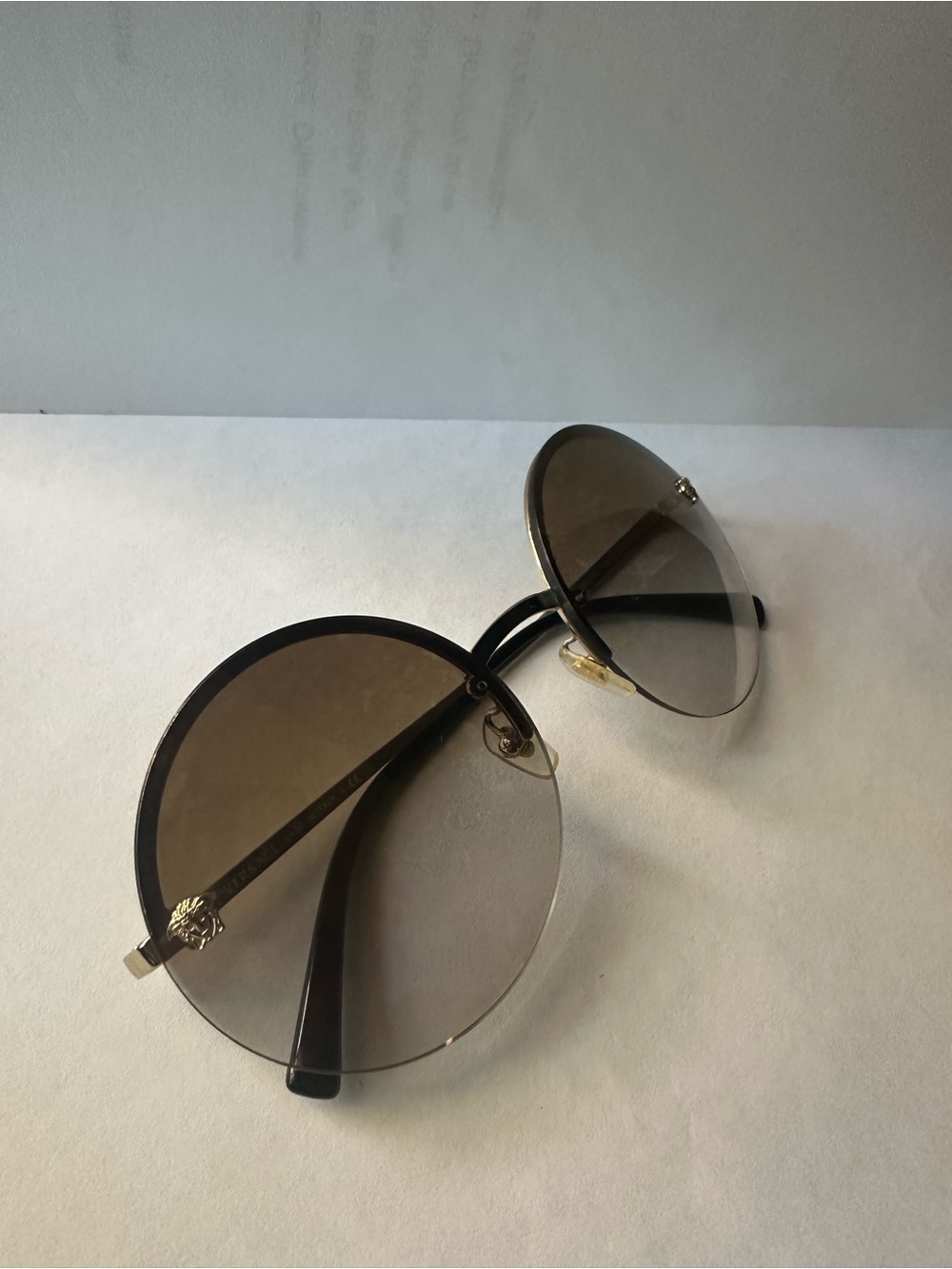 Versace Medusa Insignia Rimless Round Sunglasses in Brown and Gold